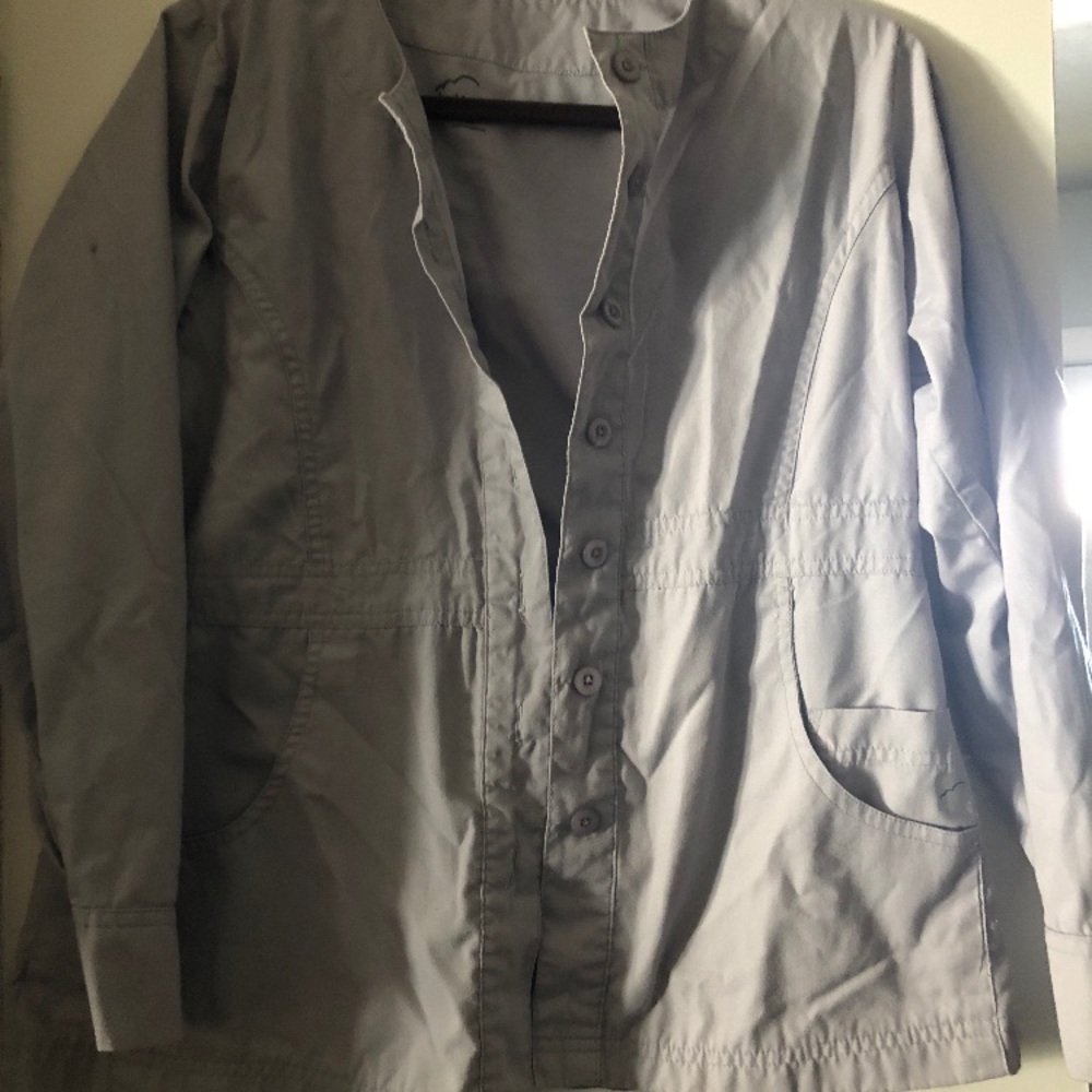 Grey scrub jacket.
